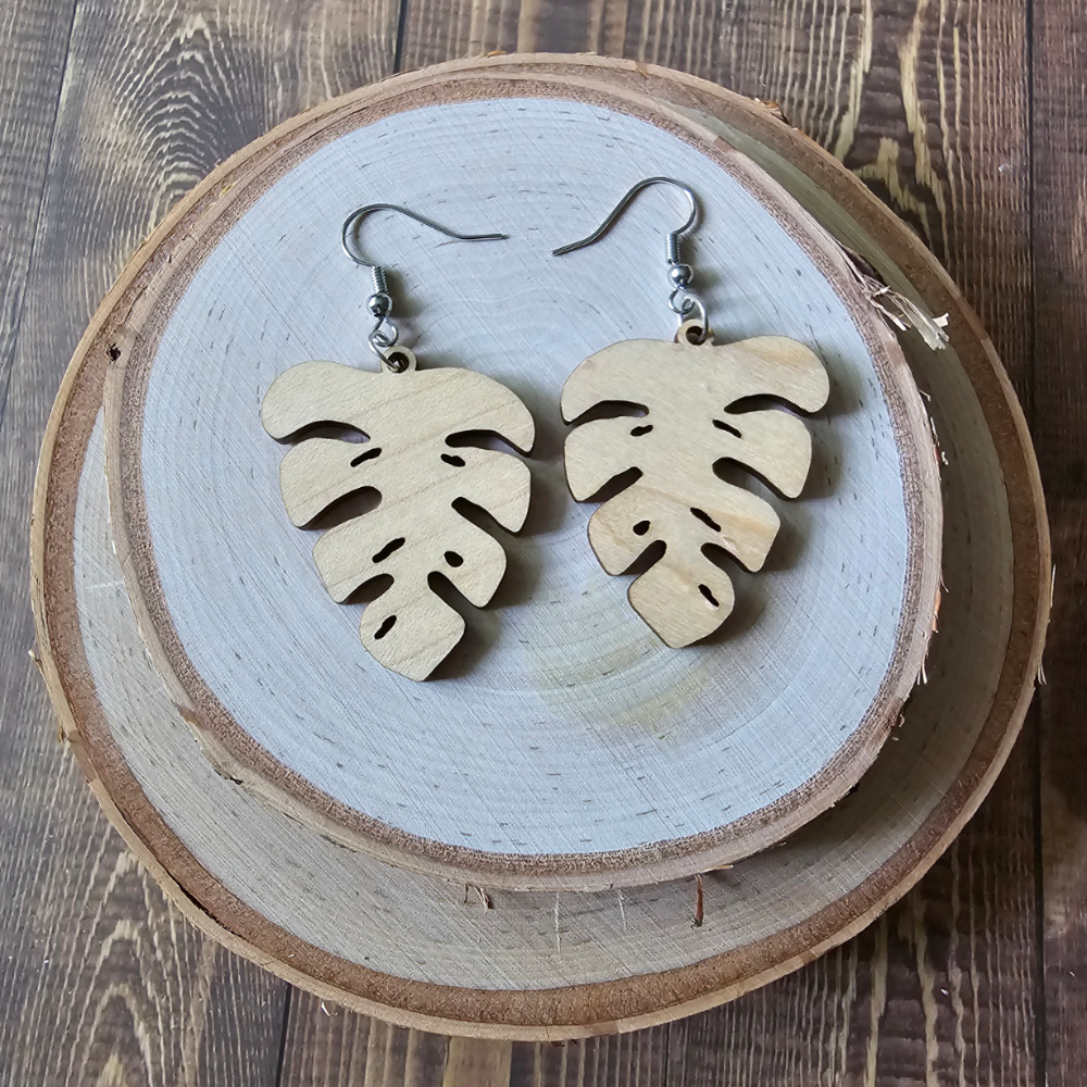 Hardwood monstera earrings, choice of maple or walnut - $20.00 - Moon Cabin Creations