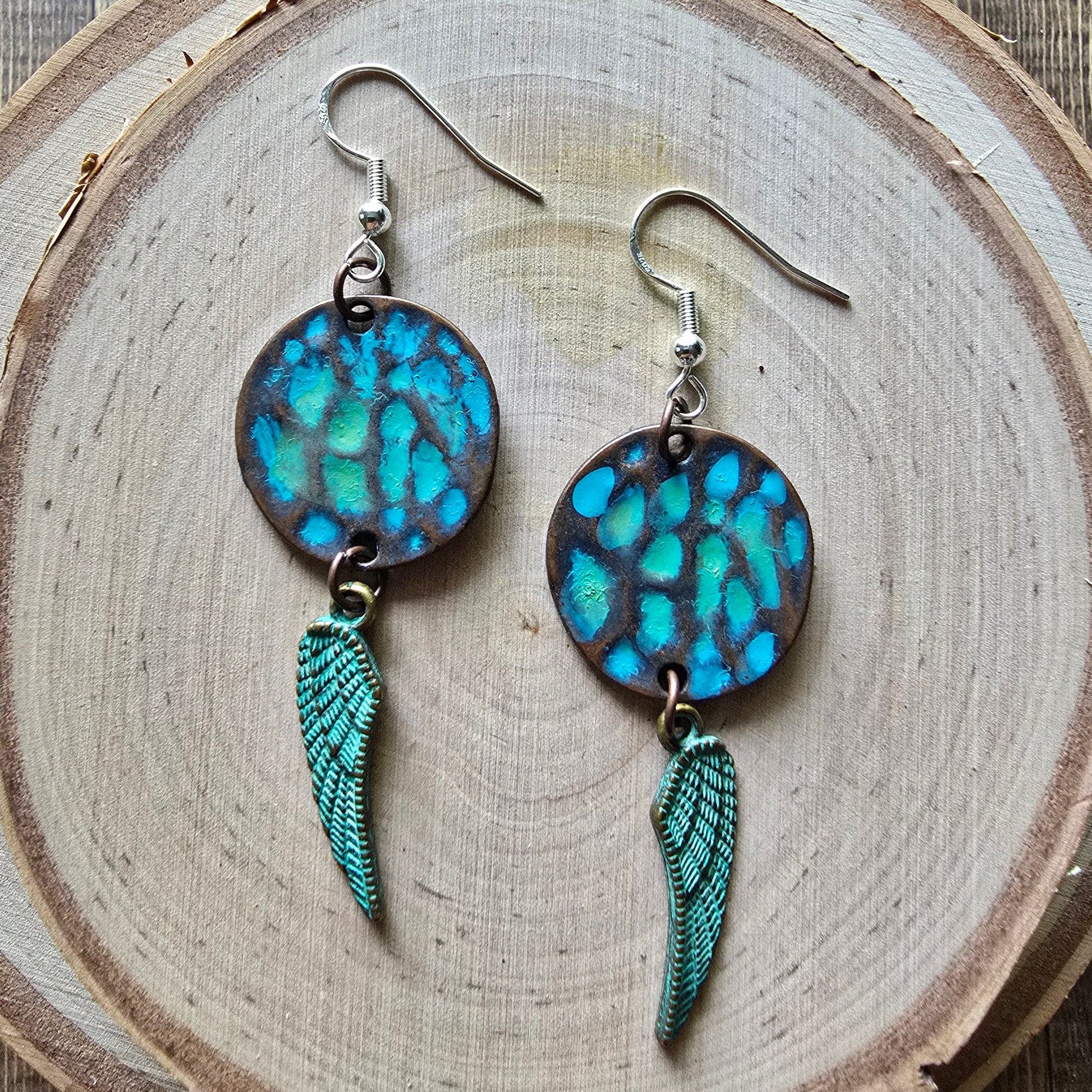 Patina metal disc and angel wing dangle earrings - $15.00 - Moon Cabin Creations