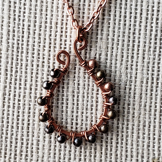 Wire wrapped hand hammered copper elongated horseshoe necklace multicolor metal accent beads - $20.00 - Moon Cabin Creations